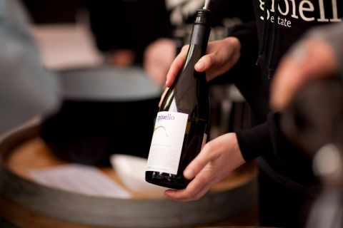 gioiello-wine-bottle-hand.jpg