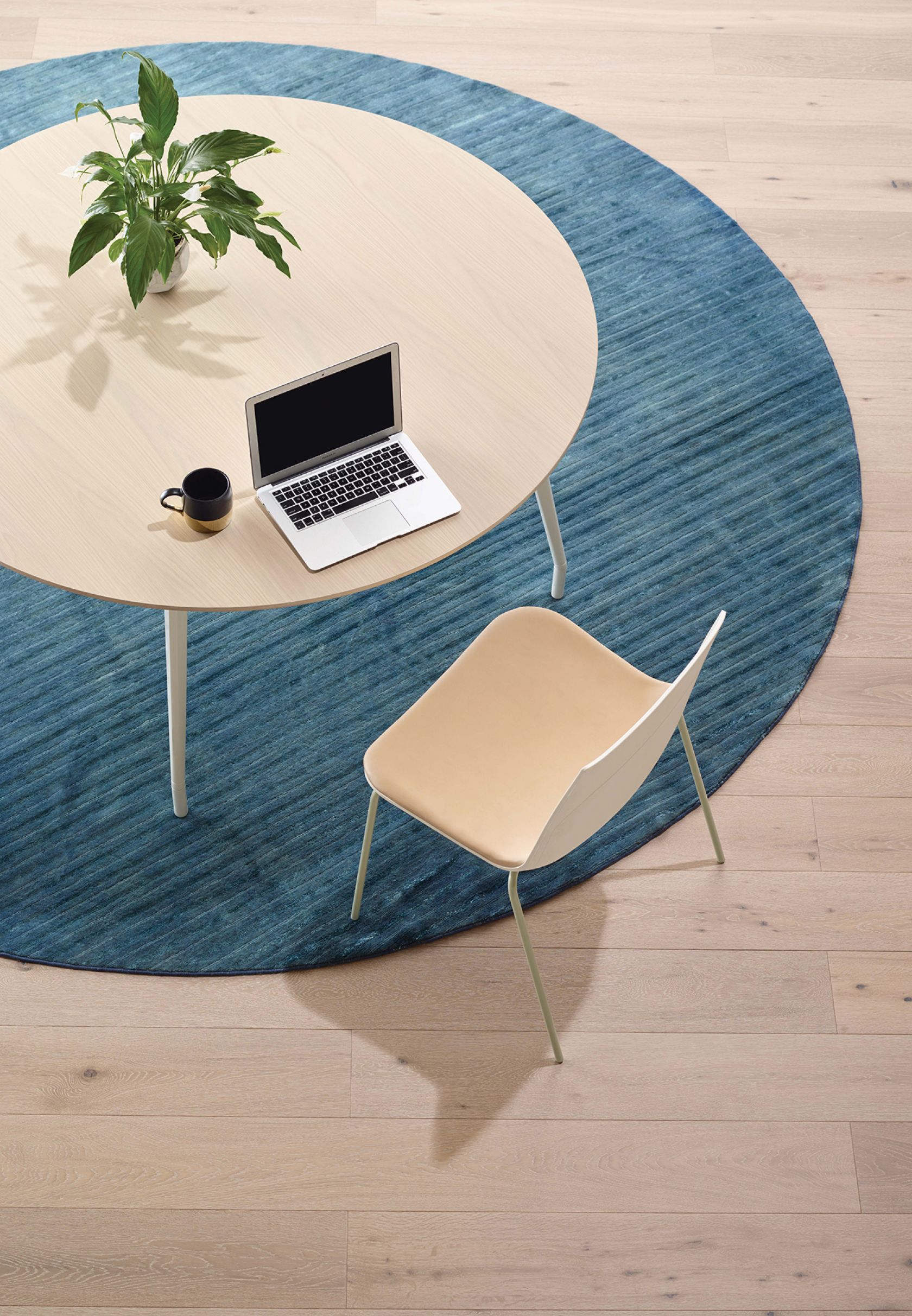 MR Chair and Aire Round Table