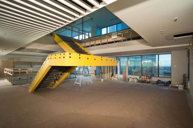 530 collins street melbourne stairs penetration construction building upgrade make good yellow 