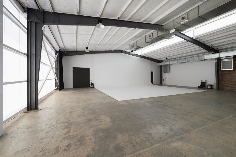 baker street studio sydney construction fitout concrete floor structural beams exposed 