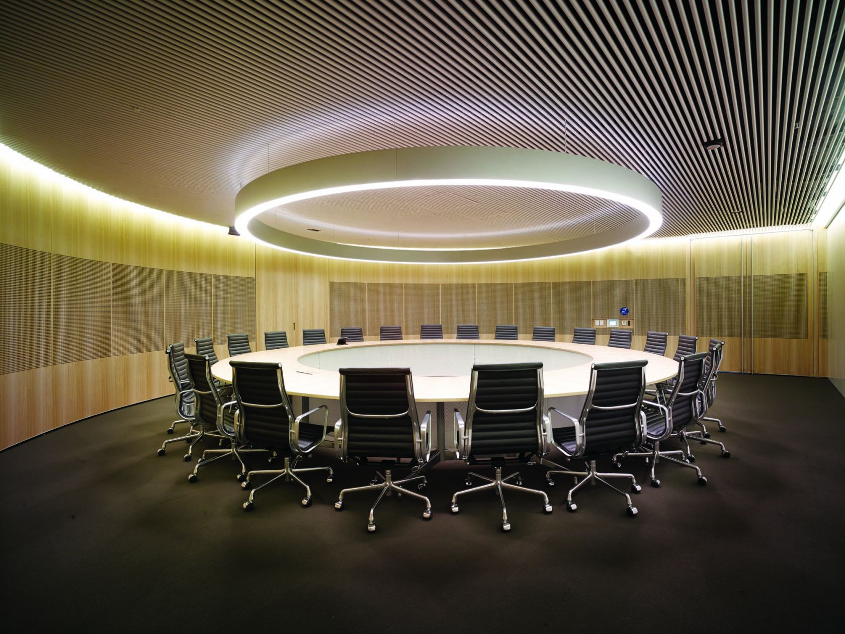 commonwealth parliament office sydney construction fitout boardroom round feature ceiling halo light timber 