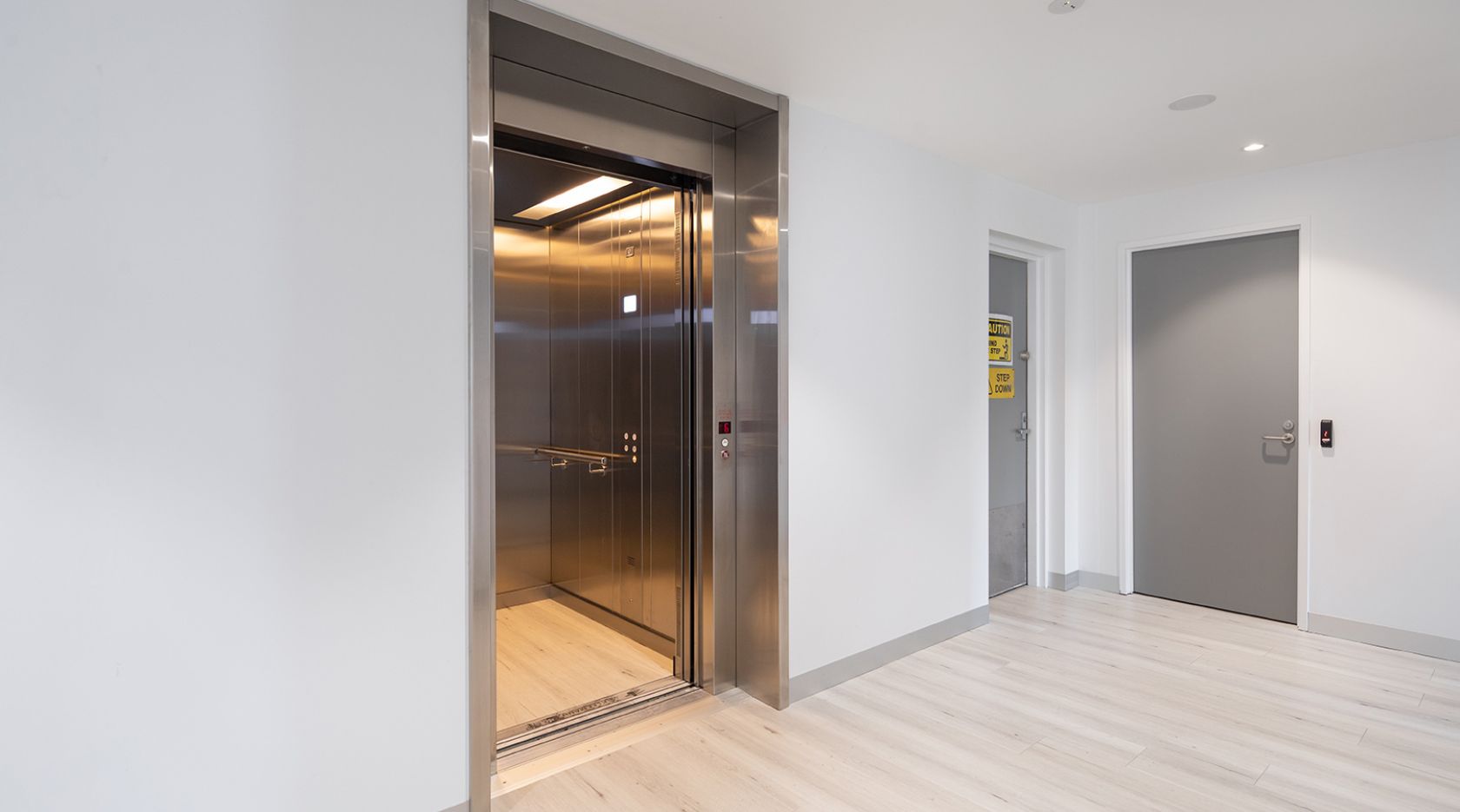 hexagon mining brisbane schiavello construction fitout industrial elevator