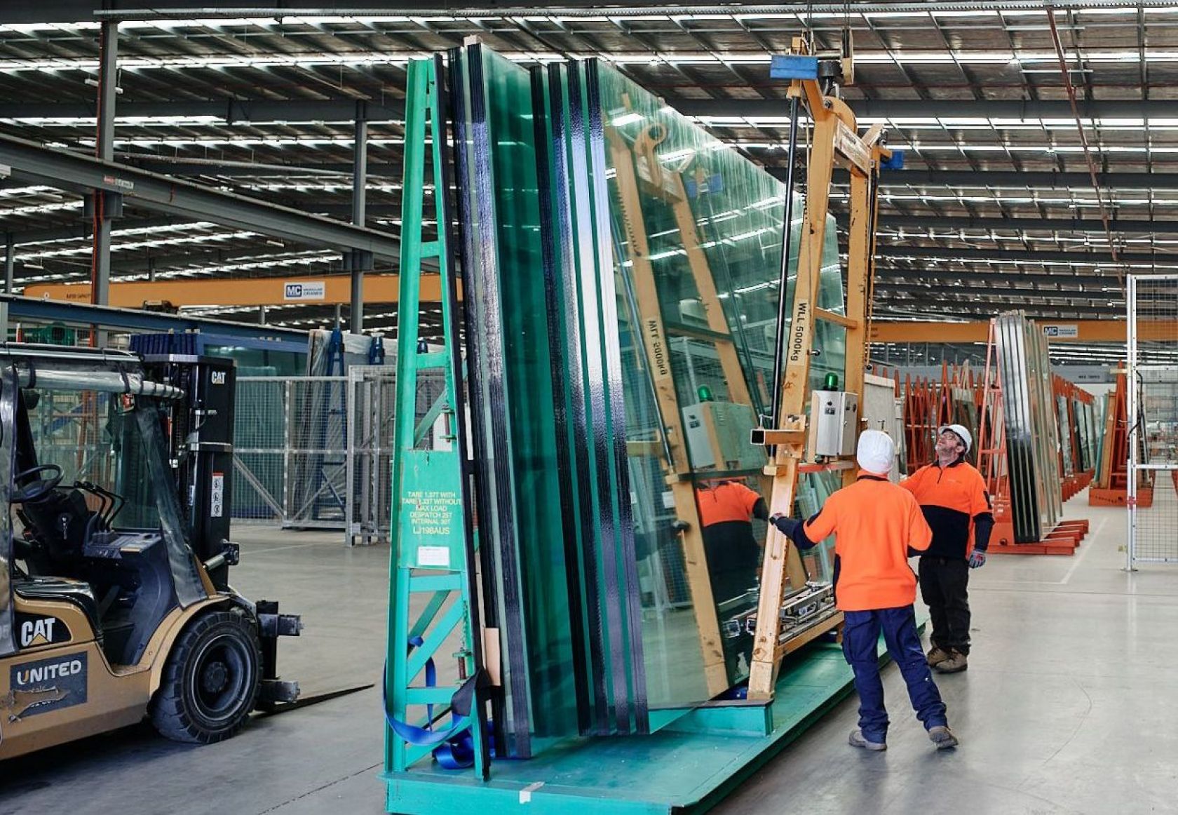 Glassworks manufacturing large sheets transported