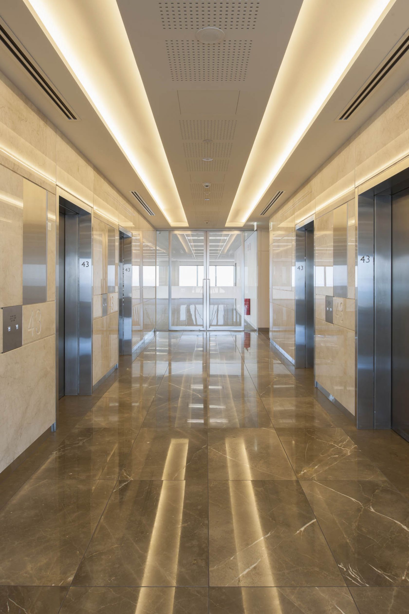 bourke place melbourne fitout lift lobby elevator stone 