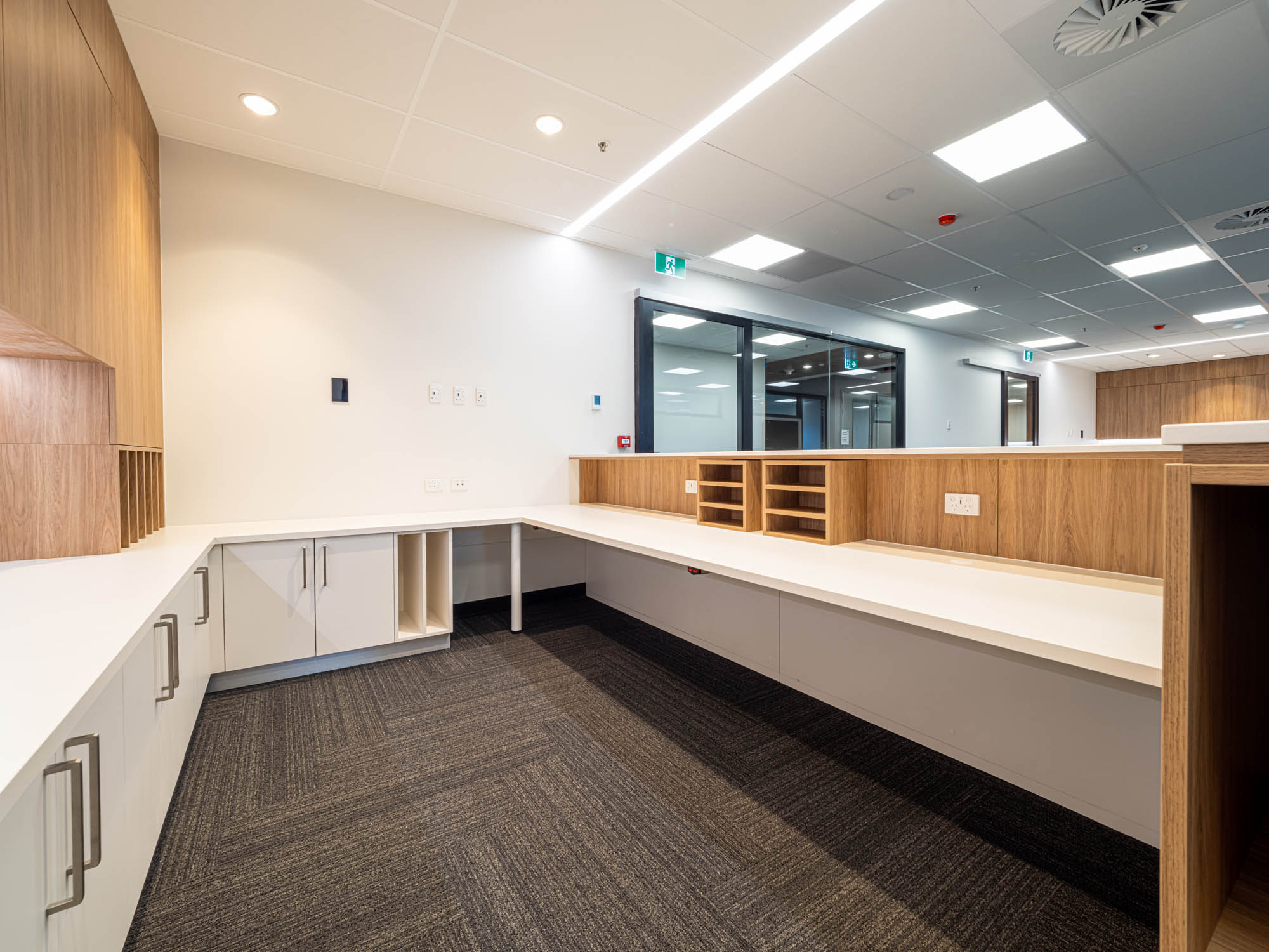 calvary adelaide hospital healthcare aged care fitout construction medical reception desk admission timber linear lighting 