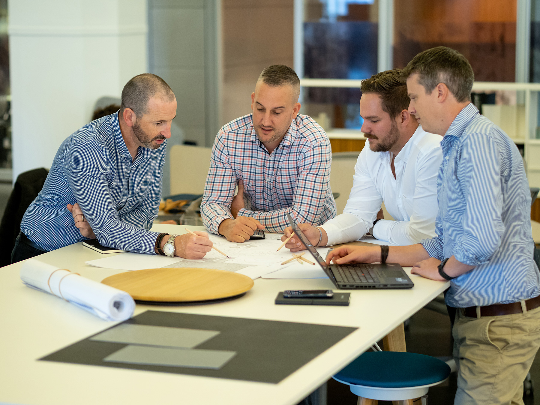 schiavello construction employees reviewing documents for early contractor engagement