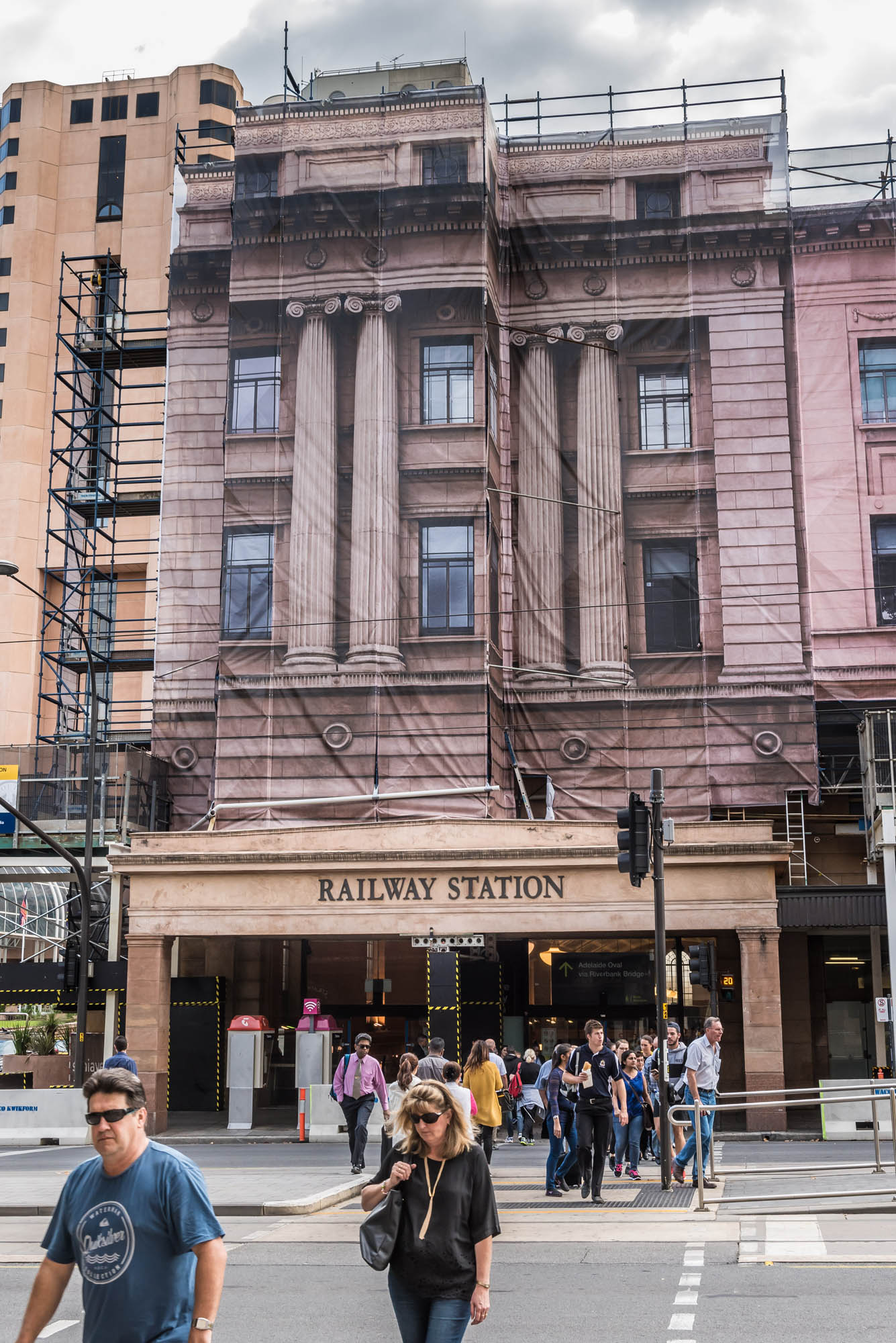 People leaving Adelaide Railway Station during its heritage facade upgrade