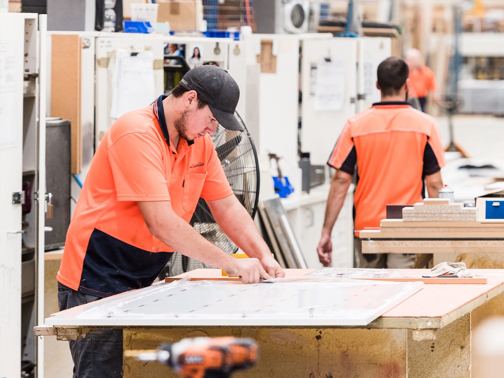 employees-in-schiavello-manufacturing-facility-cutting-sheets.jpg