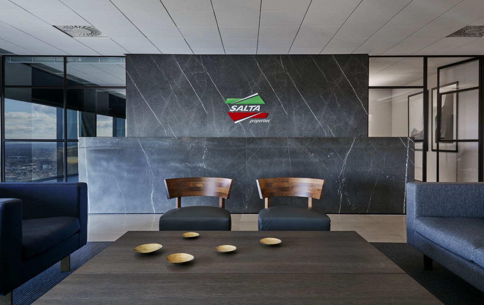 salta properties melbourne office fitout reception stone marble seating lounge glass steelwork 