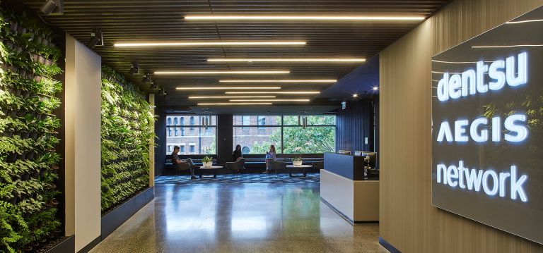 dentsu aegis network reception office fitout green wall