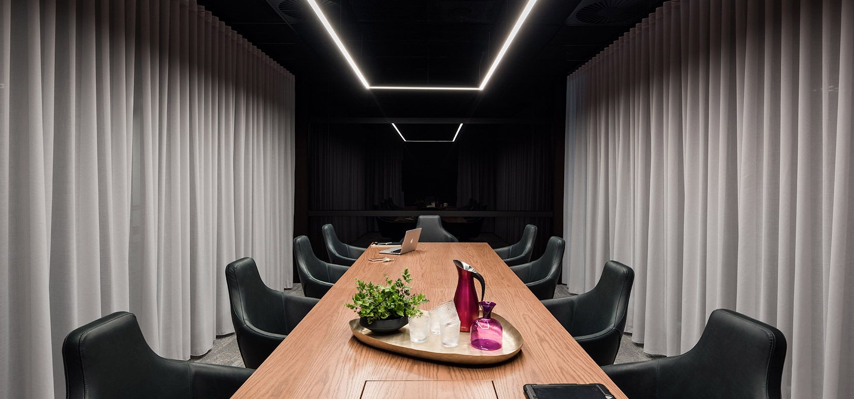 dentsu aegis network boardroom office fitout black chairs