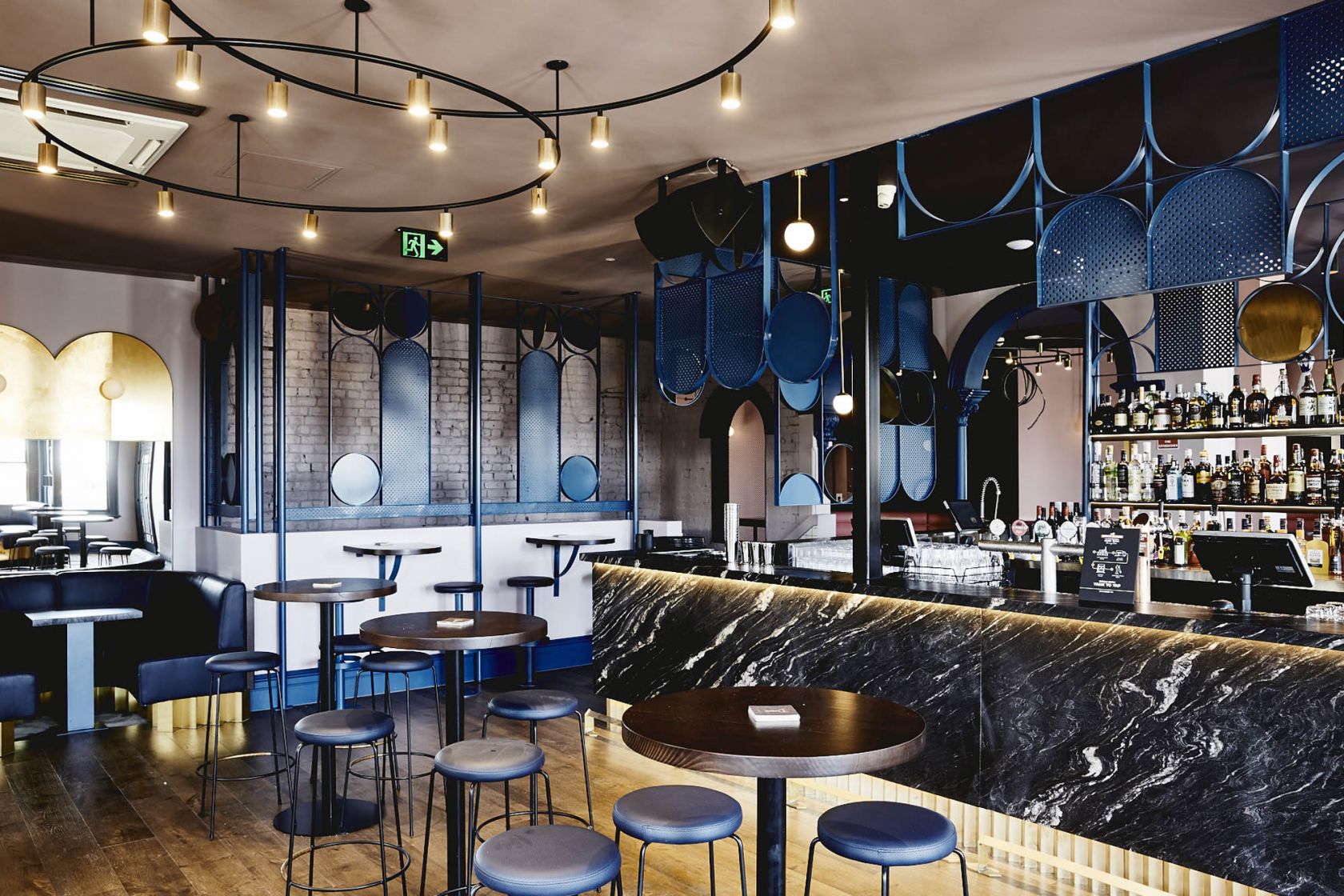 village belle hotel hospitality construction vic st kilda barkly st doulton lounge pendant lights casual cosy bar melbourne marble  bar stools seating alcohol booths