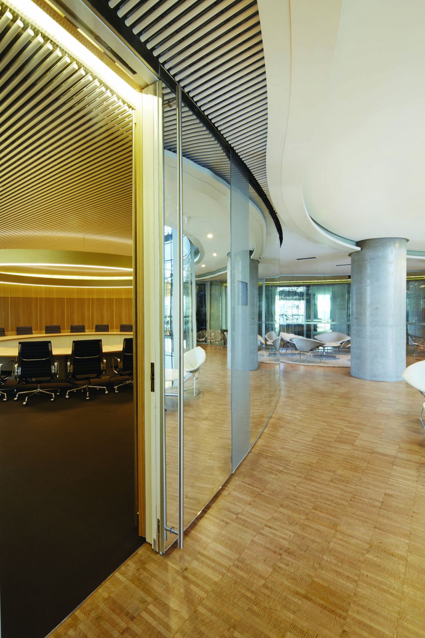 commonwealth parliament office sydney construction fitout recessed lights feature timber meeting room door glass curves 