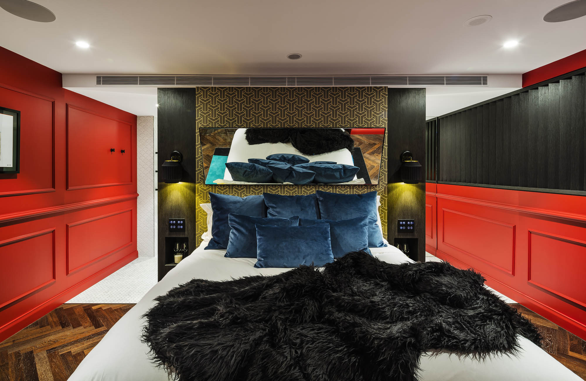 studios at the star sydney hotels design and construct nsw dark romance room red walls bed mirror black throw blanket