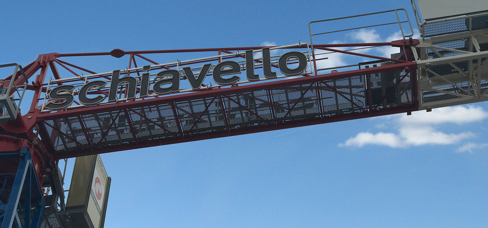 construction company crane sign in blue skye schiavello