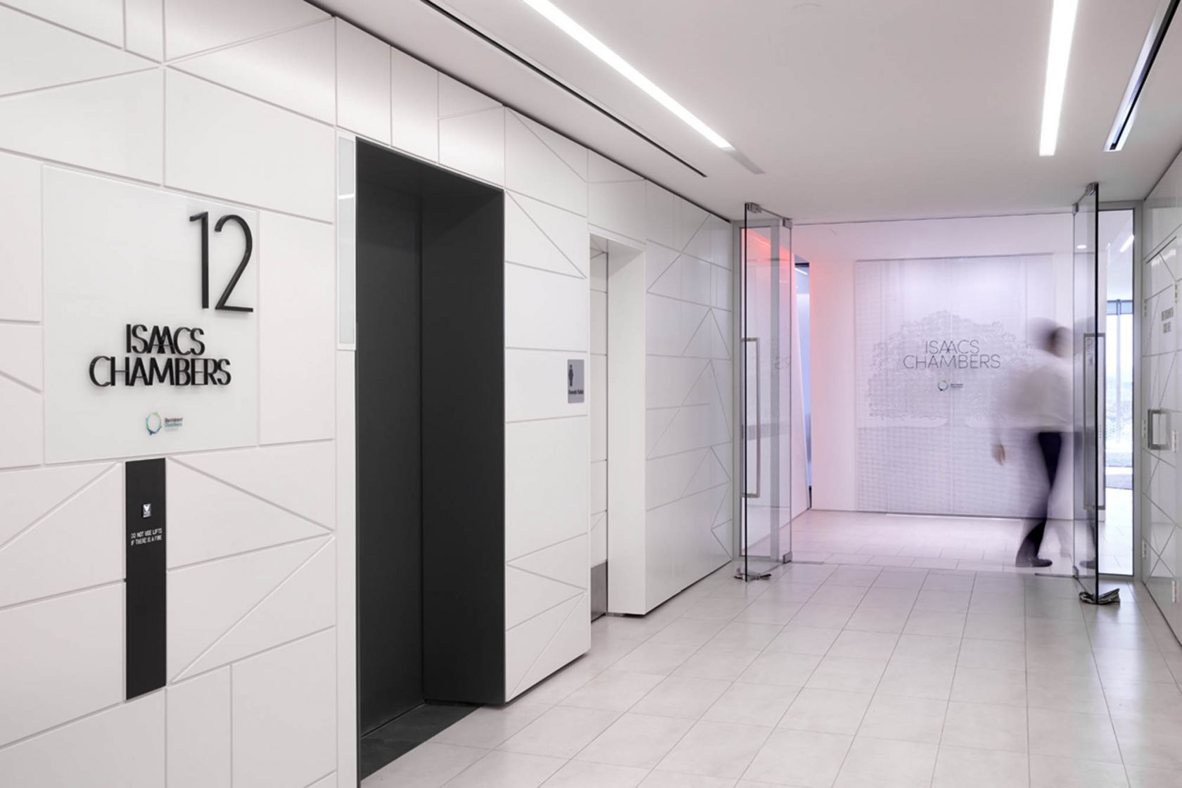 isaac chambers law fitout melbourne lift lobby signage glass doors linear lighting tiles