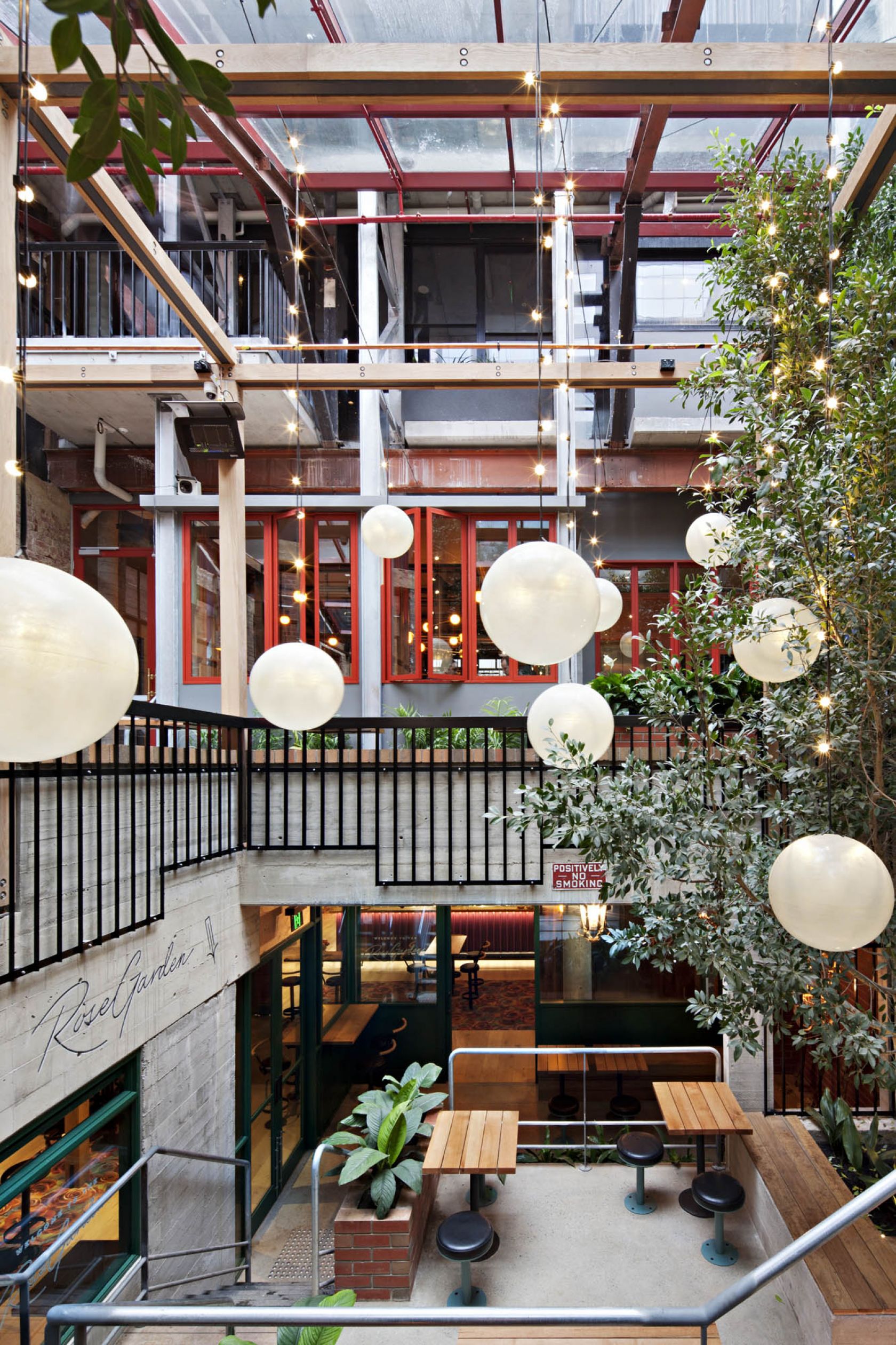 garden state hotel melbourne fitout outdoor alfresco trees pendant lighting balustrades mezzanine