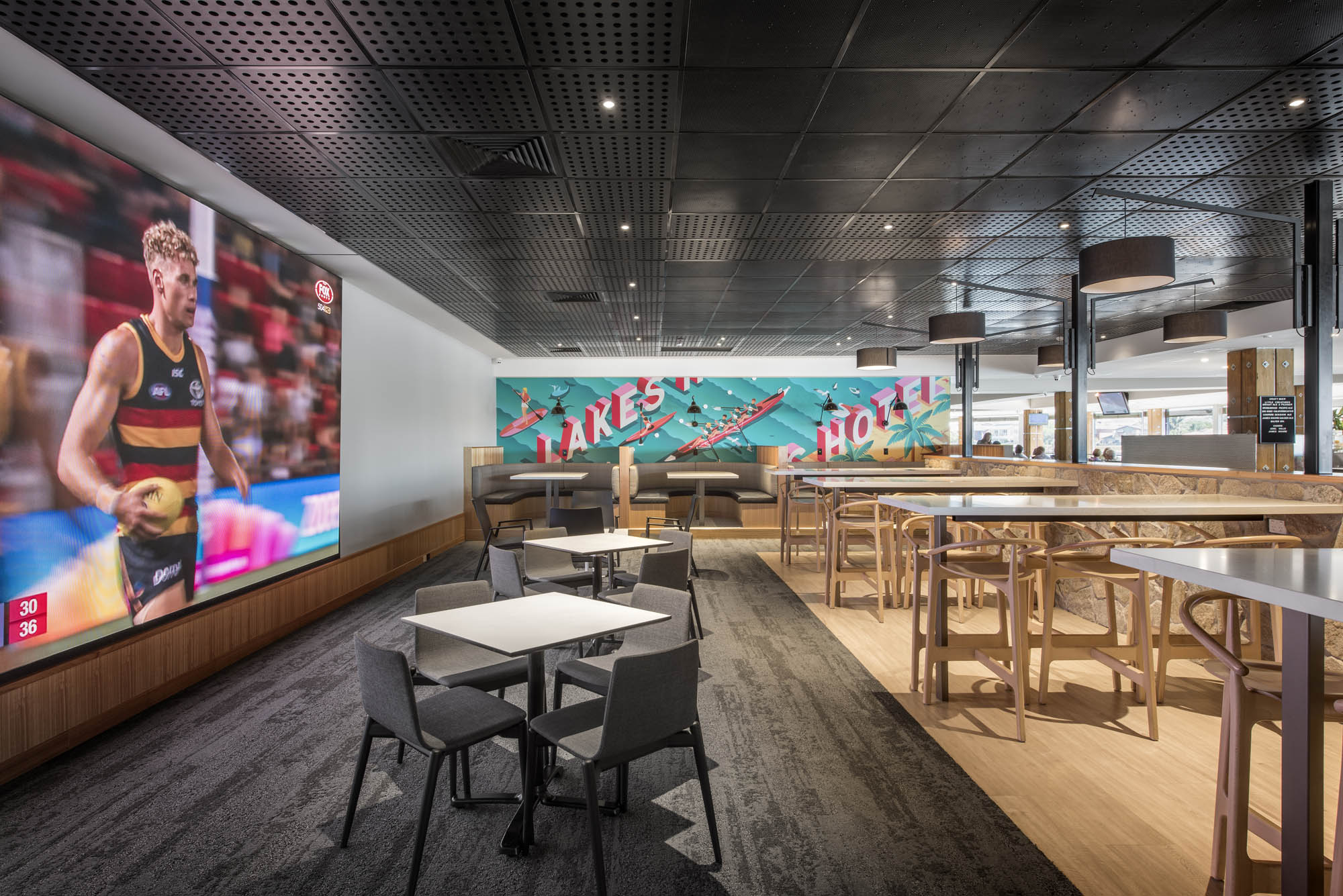 lakes hotel hospitality interior construction sa adelaide west lakes sports bar signage big screen tv afl football food high tables high stools