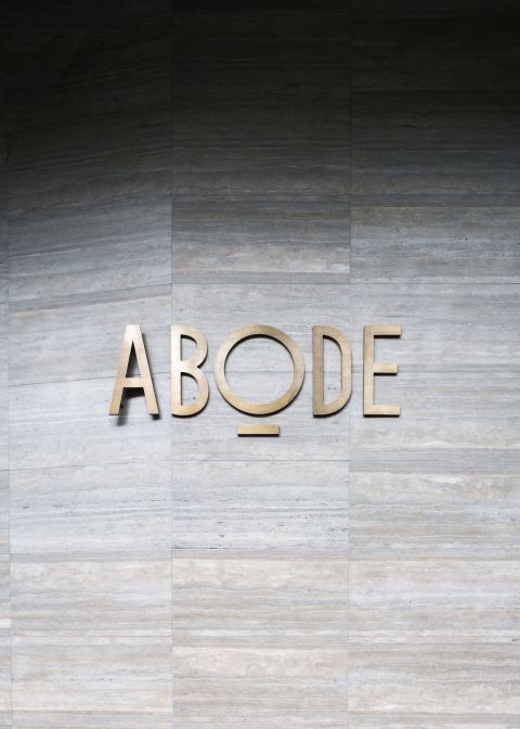 abode318-interior-facade-gold-logo.jpg