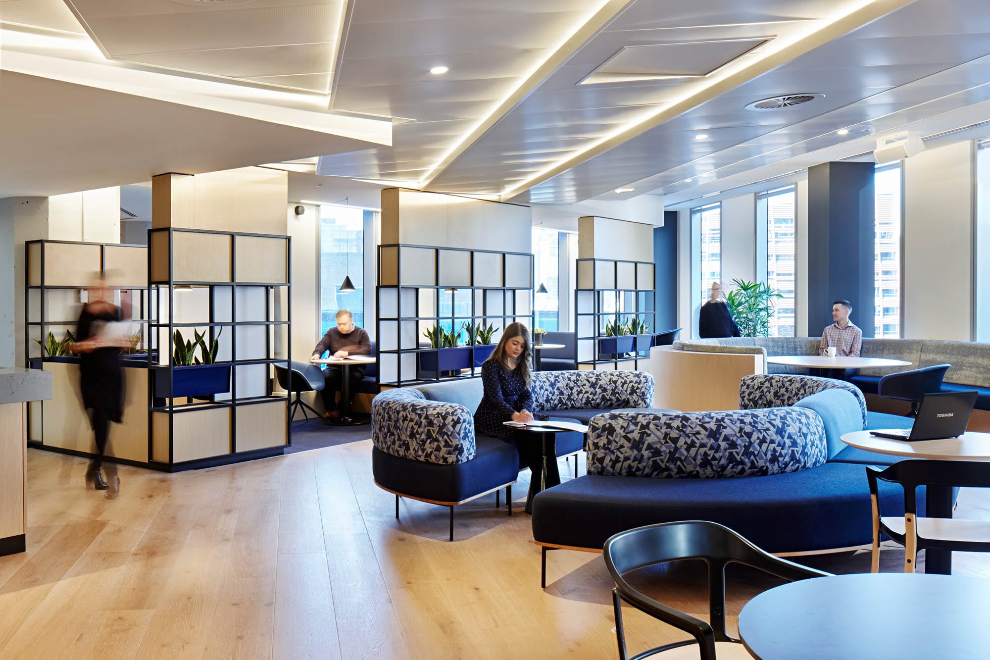 bank of melbourne office agile working area with blue lounge chairs