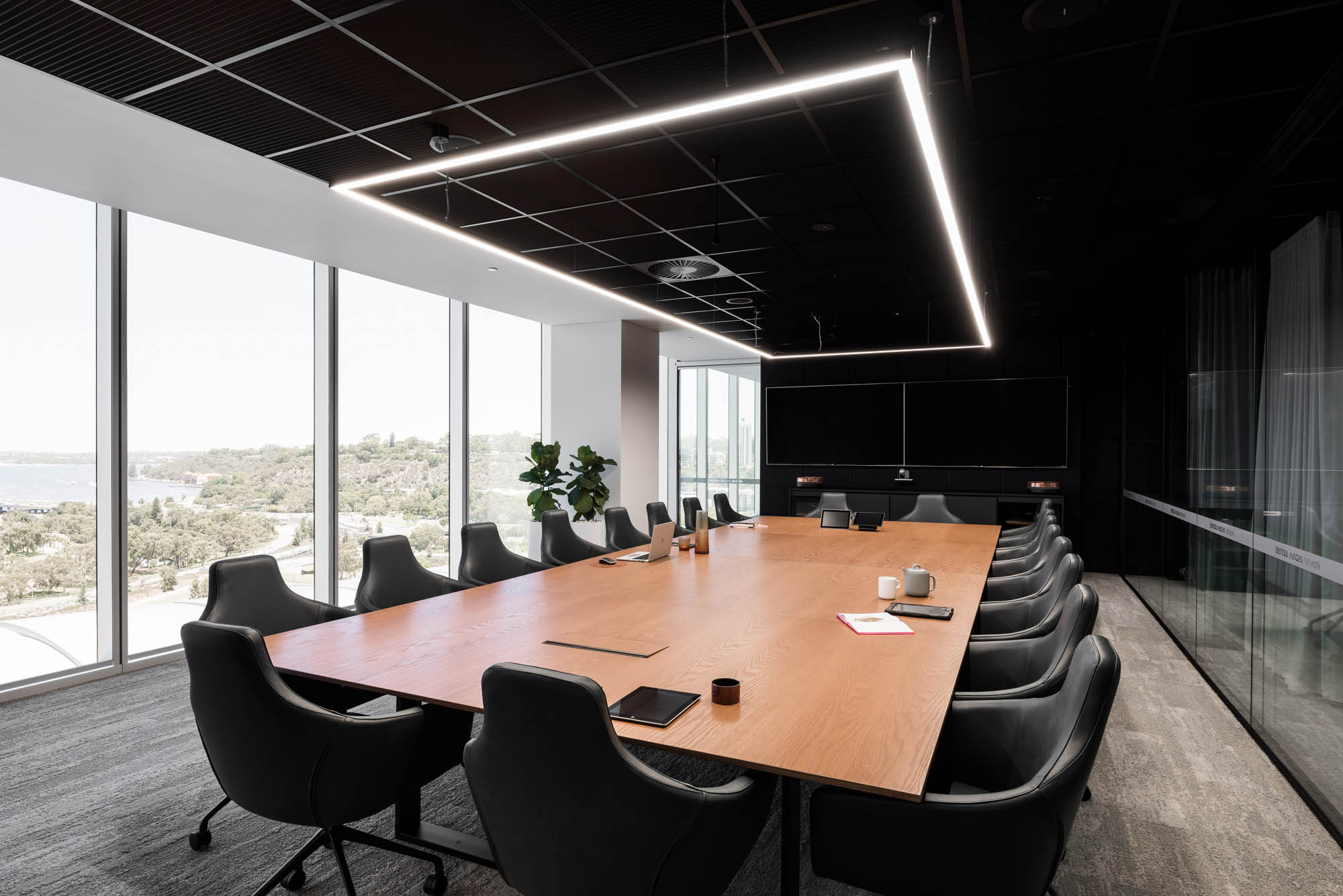 boardroom table with rectangle led light and schiavello palomino chairs
