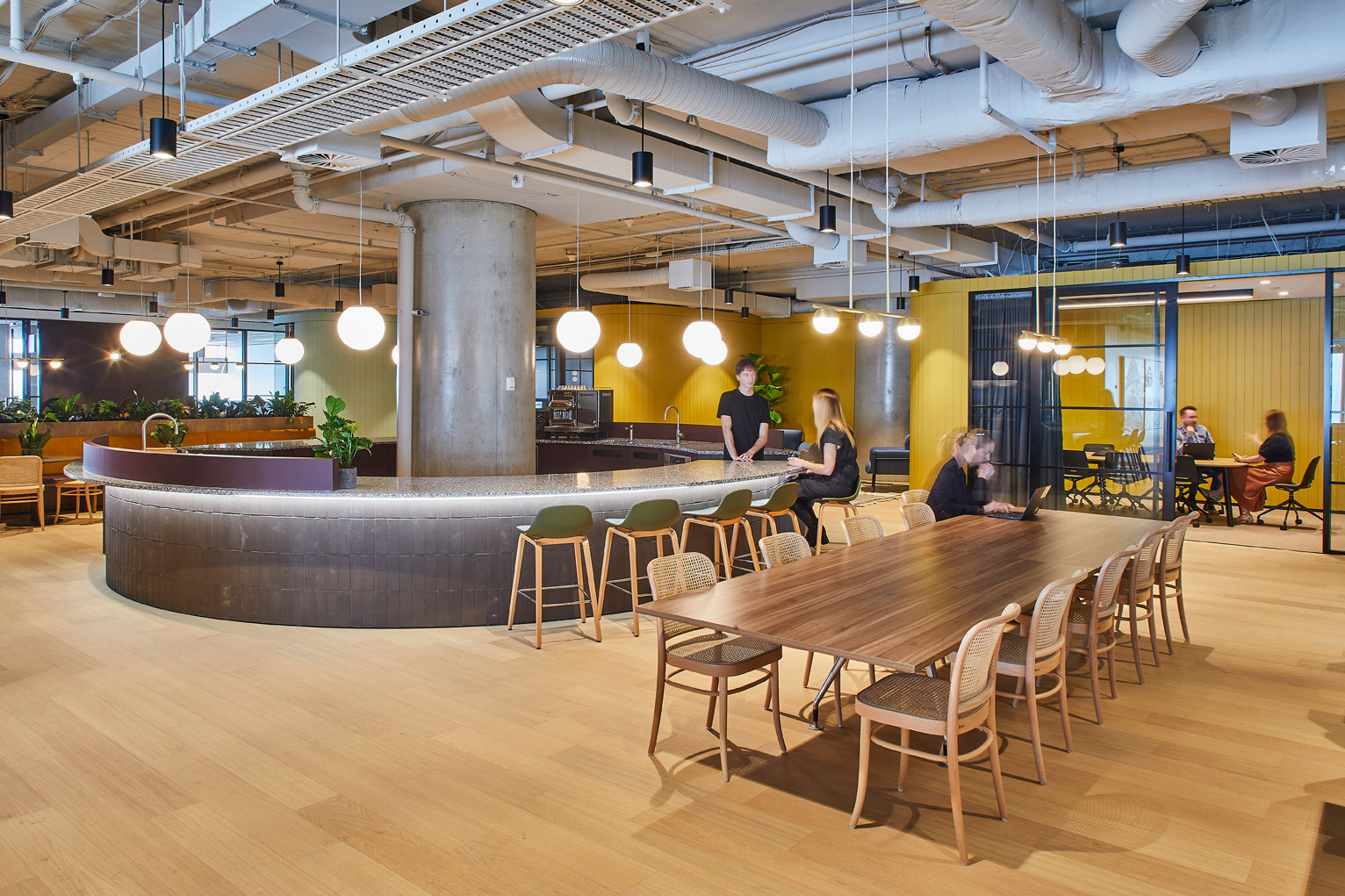 Round Kitchen area with people working