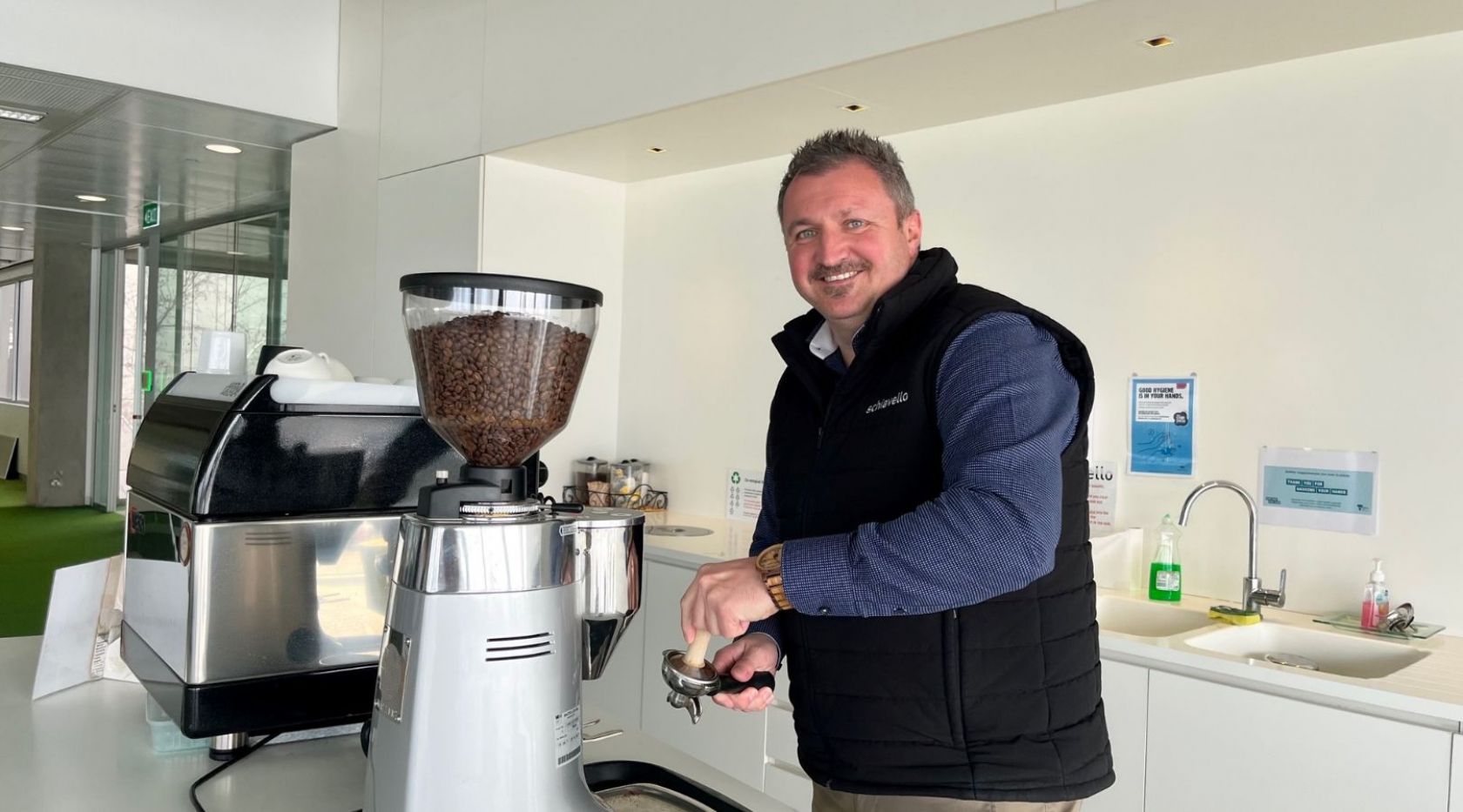 Justin Hoffman working the coffee machine